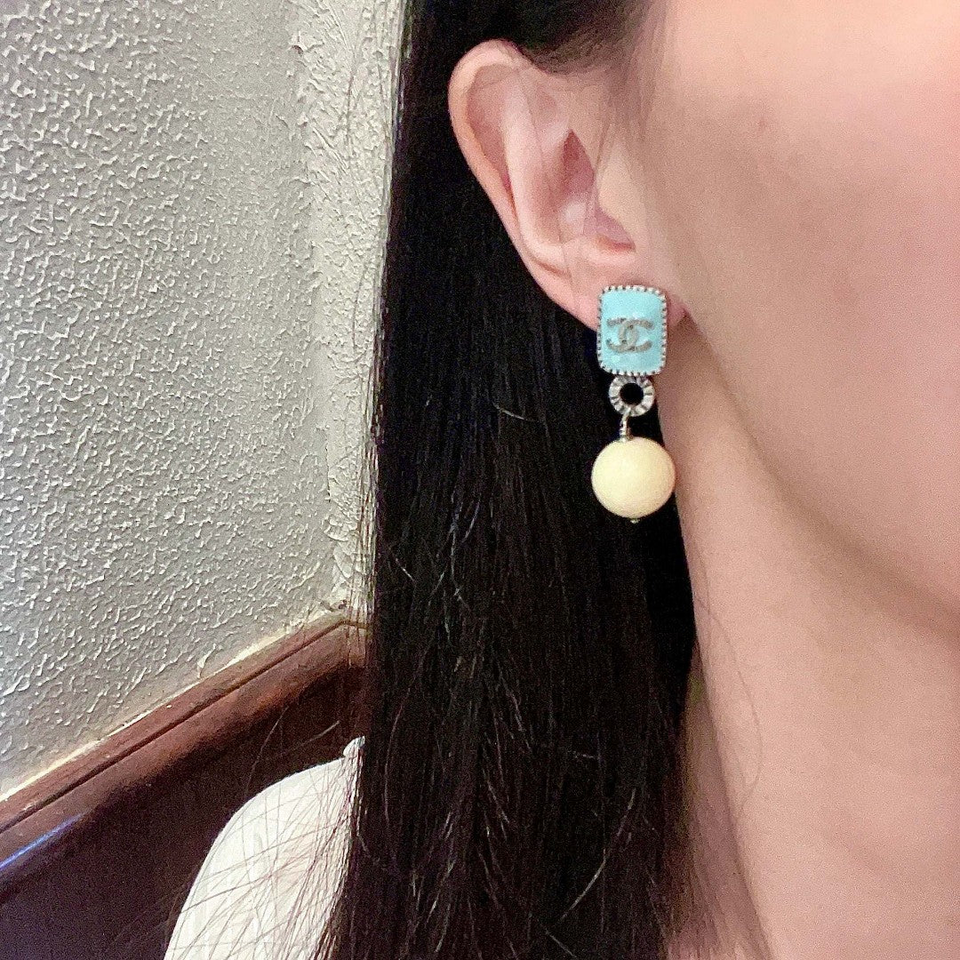 Double-C Emblem Pearl-Detail Statement Earrings – Pearl Detail – Design 030 detail view