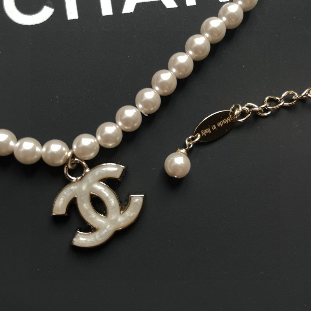 Double-C Emblem Pearl-Detail Pendant Necklace – Pearl Detail – Design 123 close-up detail