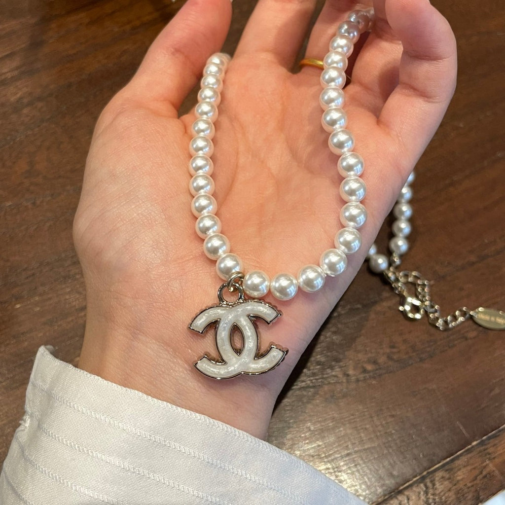 Double-C Emblem Pearl-Detail Pendant Necklace – Pearl Detail – Design 123 front product view