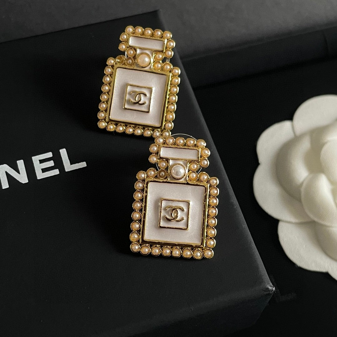 Double-C Emblem Pearl-Detail Stud Earrings – Pearl Detail – Design 026 detail view