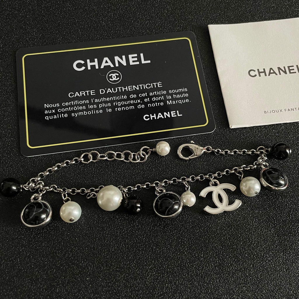Signature Emblem Bracelet in Polished Metal-Tone – Black Detail – Design 003 main product view