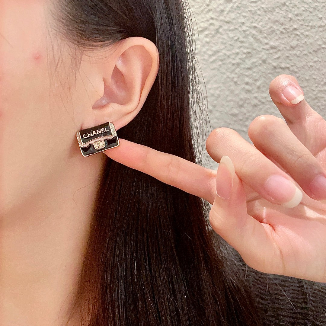 Double-C Emblem Stud Earrings in Polished Metal-Tone – Design 375 front product view