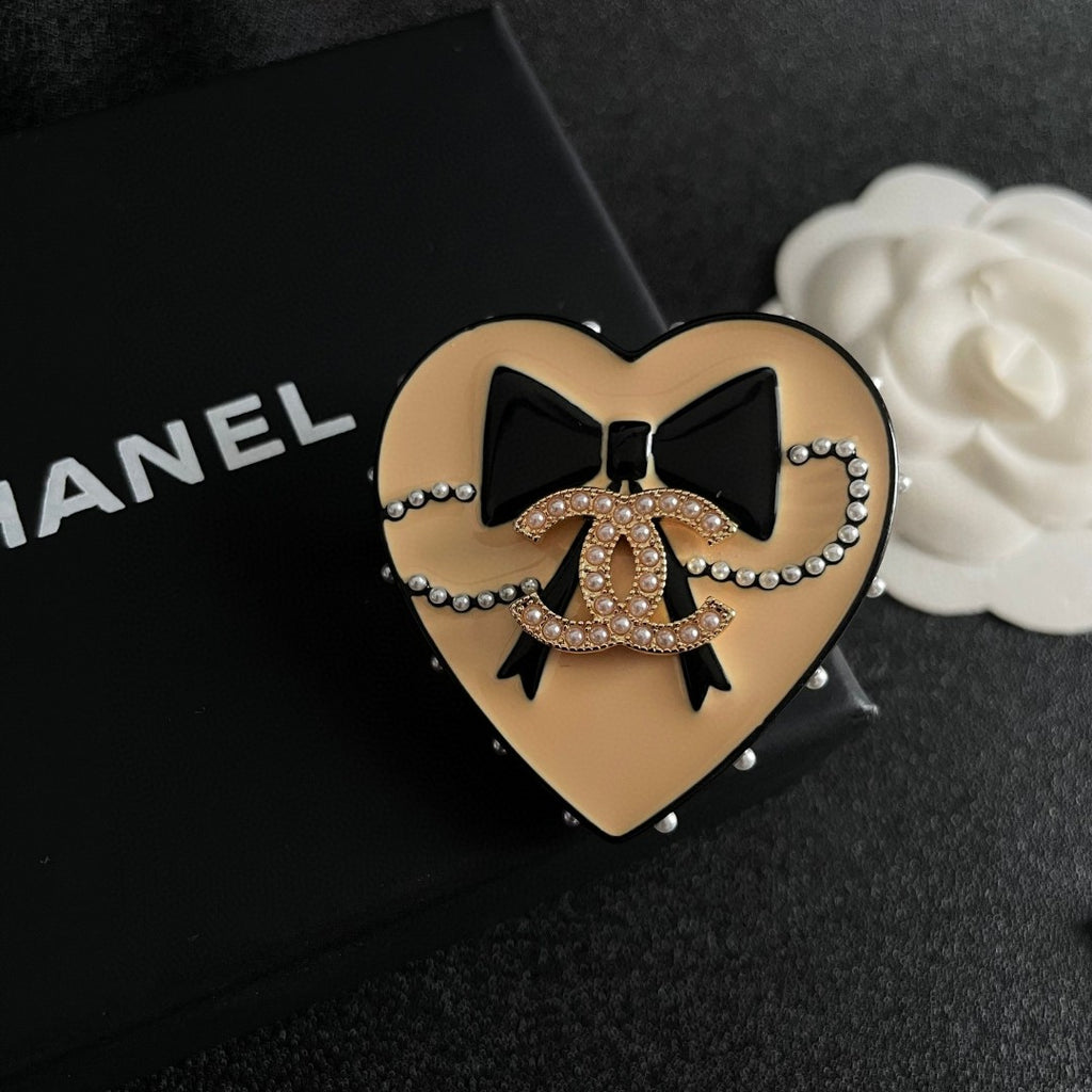 Double-C Emblem Brooch in Polished Metal-Tone – Design 074 detail view