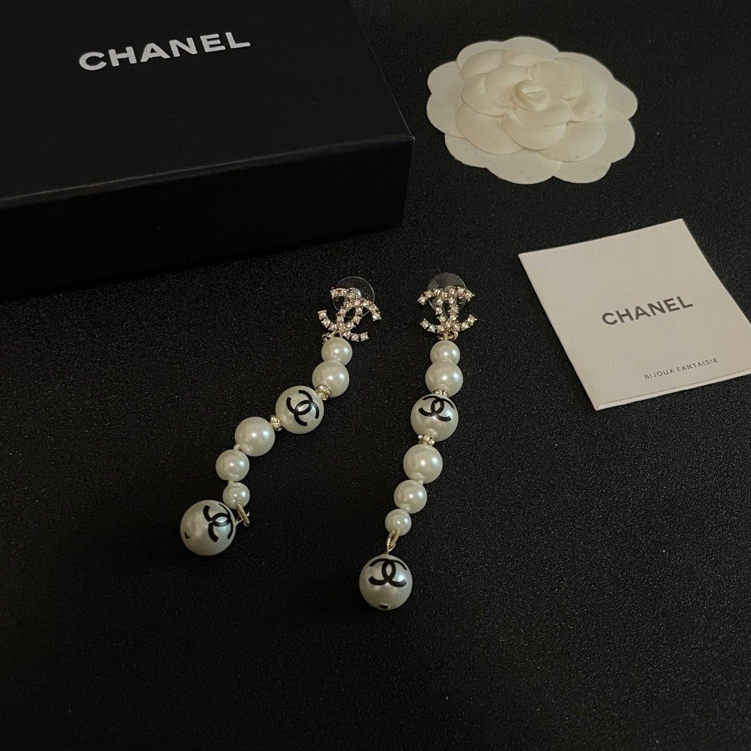 Double-C Emblem Pearl-Detail Statement Earrings – Pearl Detail – Design 028 styled product view