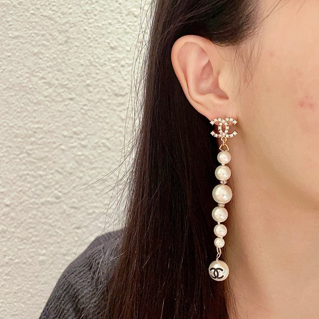Double-C Emblem Pearl-Detail Statement Earrings – Pearl Detail – Design 028 detail view