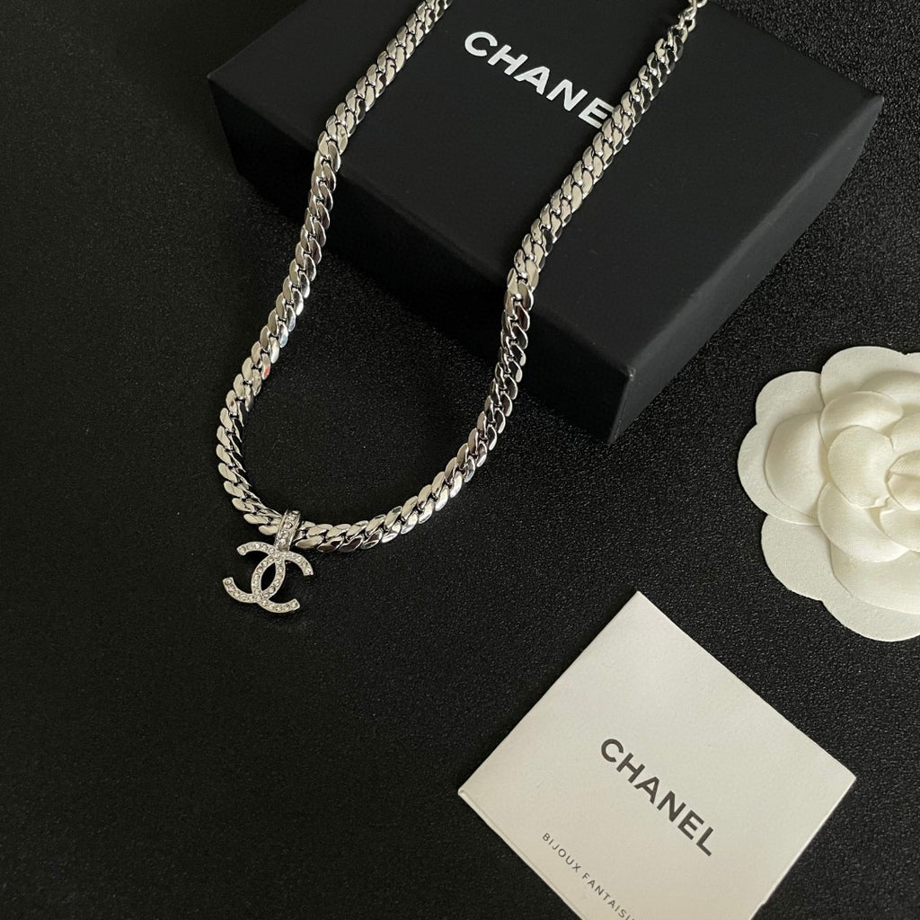 Double-C Emblem Pendant Necklace in Polished Metal-Tone – Design 070 close-up detail