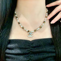 Double-C Emblem Pearl-Detail Pendant Necklace – Pearl Detail – Design 109 main product view