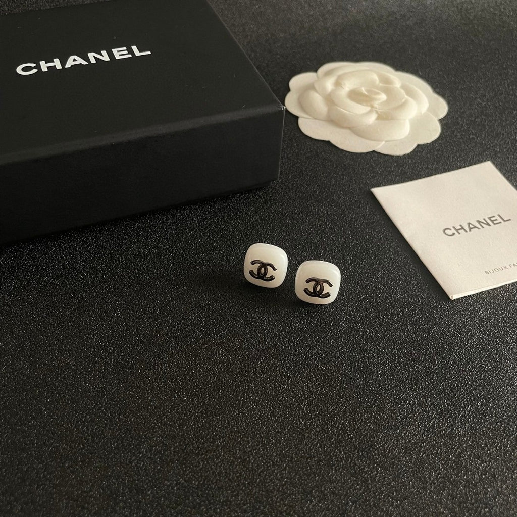 Double-C Emblem Stud Earrings in Polished Metal-Tone – Design 364 styled product view