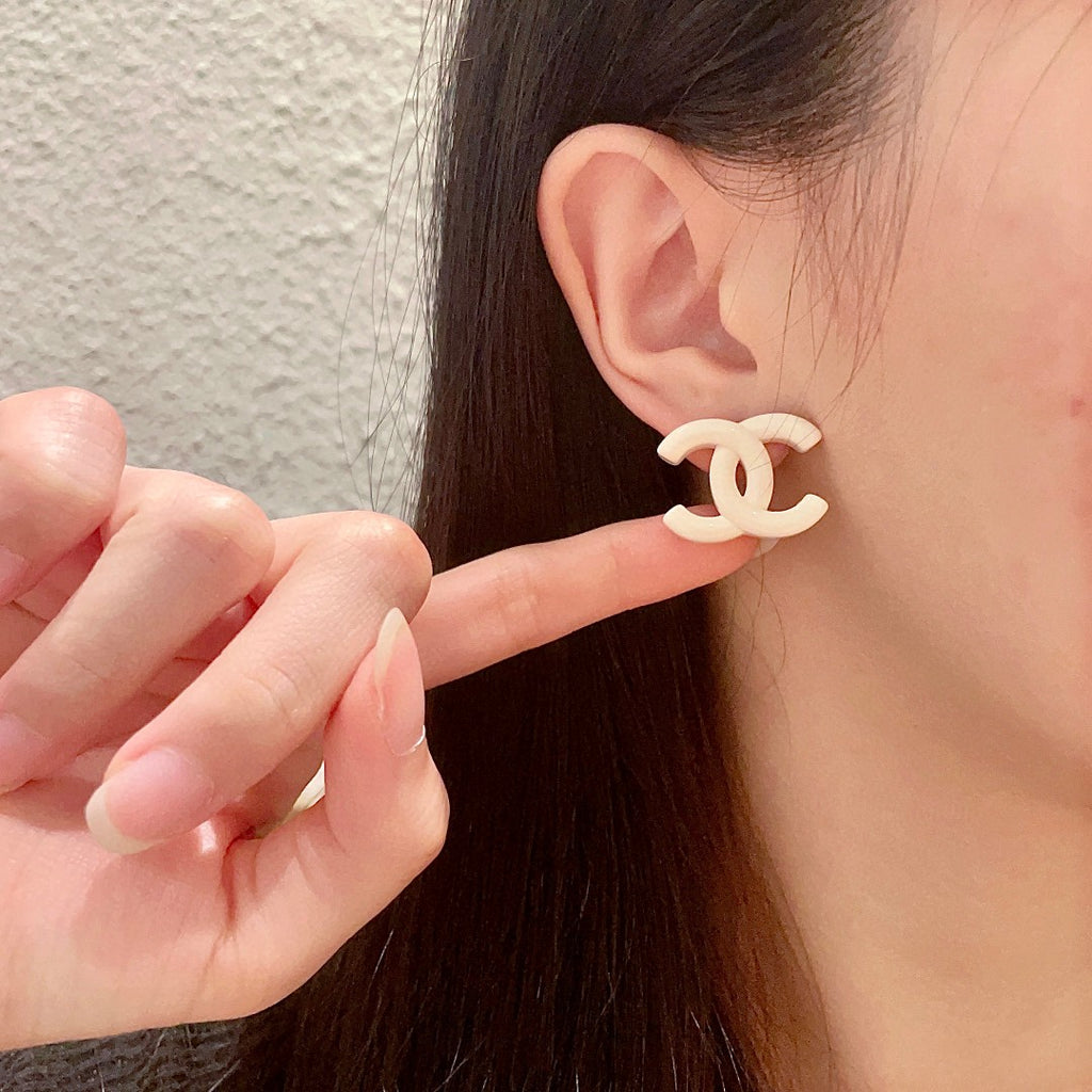 Double-C Emblem Stud Earrings in Polished Metal-Tone – Design 363 front product view