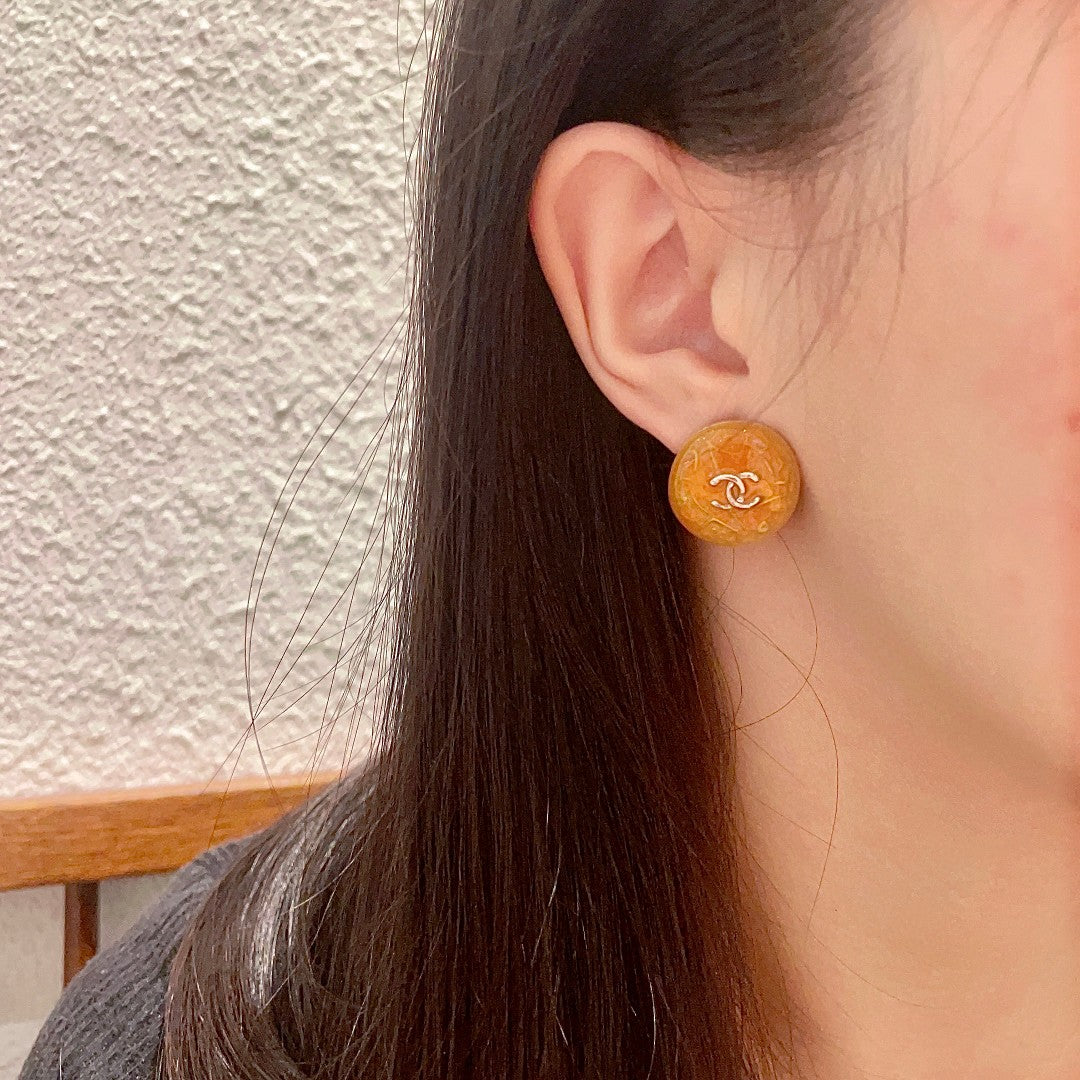 Double-C Emblem Stud Earrings in Polished Metal-Tone – Design 362 detail view