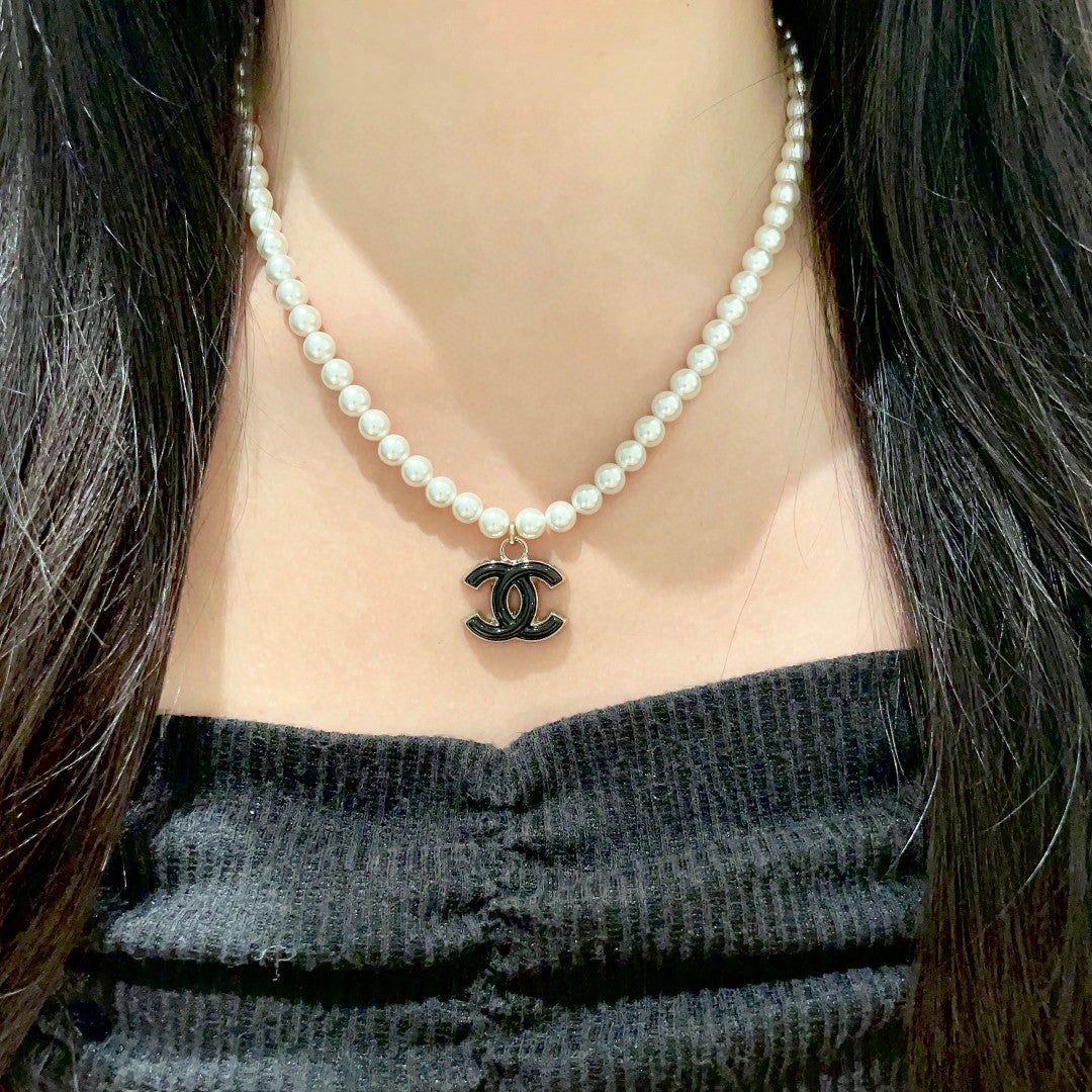 Double-C Emblem Pearl-Detail Pendant Necklace – Pearl Detail – Design 108 detail view