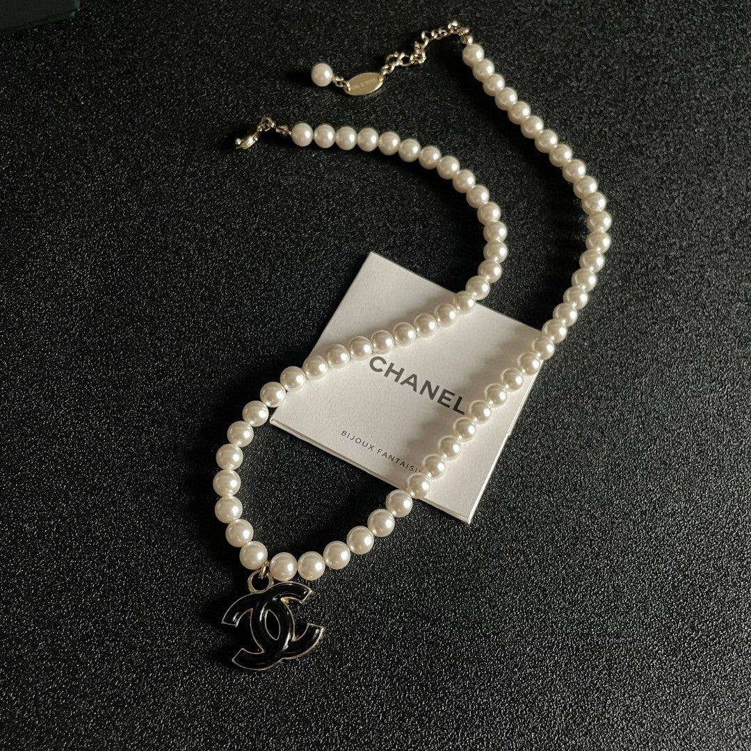 Double-C Emblem Pearl-Detail Pendant Necklace – Pearl Detail – Design 108 detail view