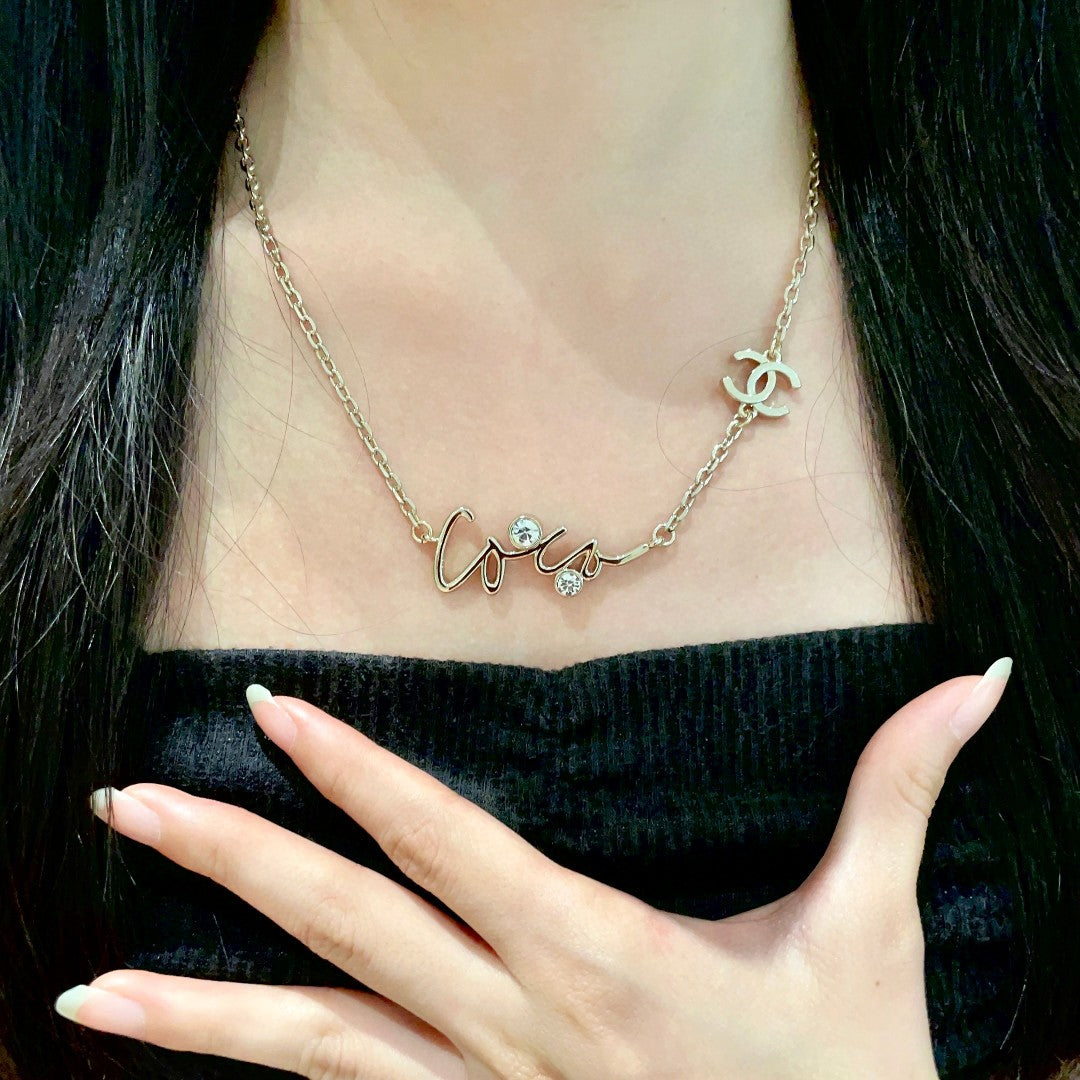 Double-C Emblem Pendant Necklace in Polished Metal-Tone – Design 062 front product view