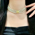 Double-C Emblem Pearl-Detail Pendant Necklace – Pearl Detail – Design 107 main product view