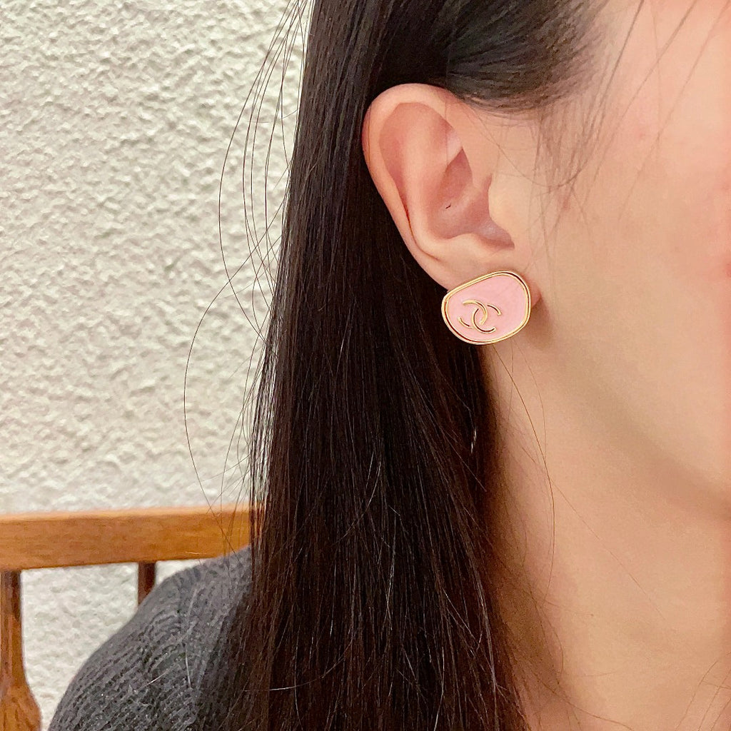 Double-C Emblem Stud Earrings in Polished Metal-Tone – Design 360 detail view