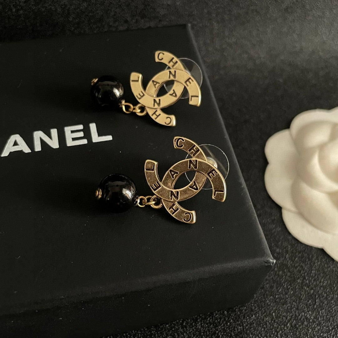 Double-C Emblem Statement Earrings in Polished Metal-Tone – Design 059 detail view
