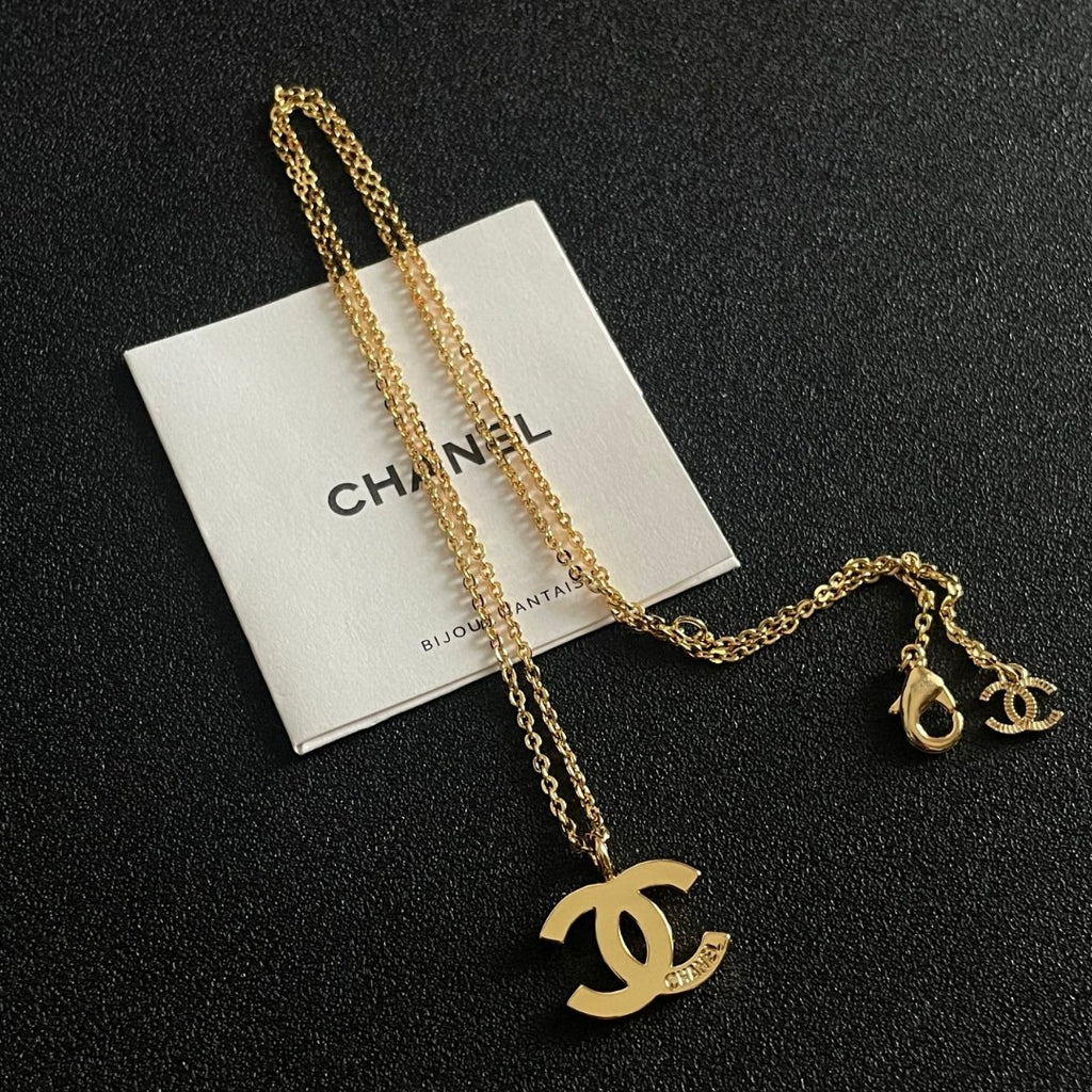 Double-C Emblem Pendant Necklace in Polished Metal-Tone – Design 058 detail view