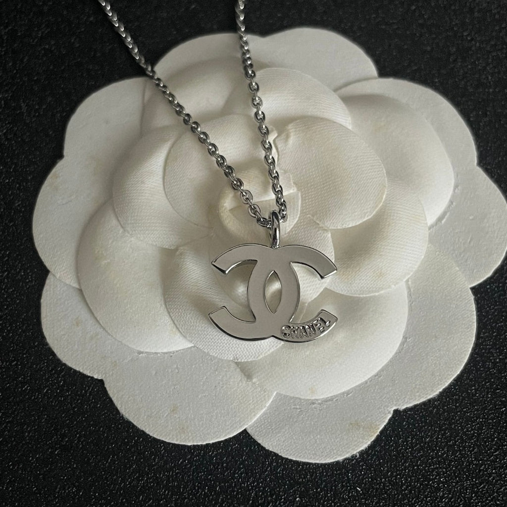 Double-C Emblem Pendant Necklace in Polished Metal-Tone – Design 057 front product view