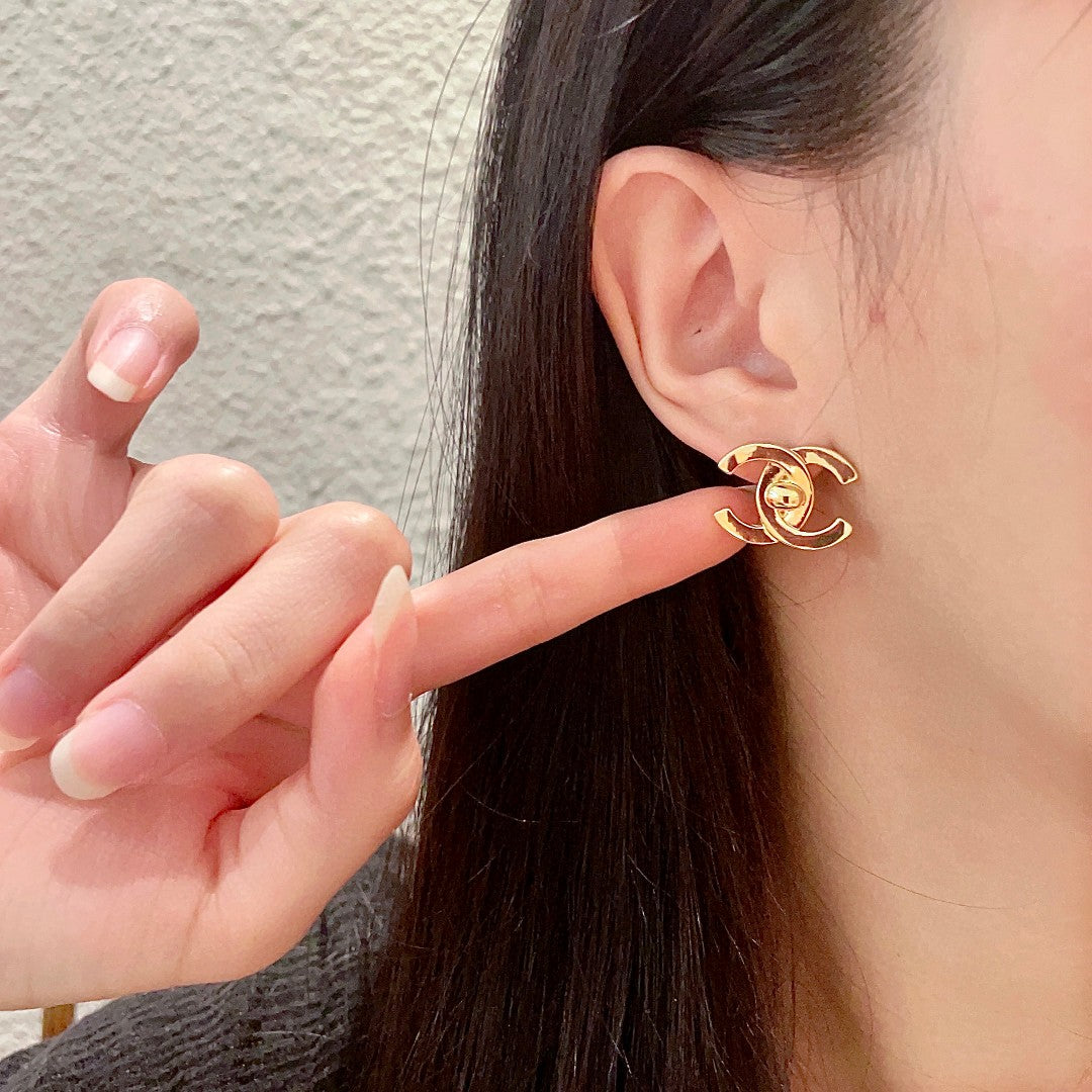 Double-C Emblem Stud Earrings in Polished Metal-Tone – Design 349 front product view