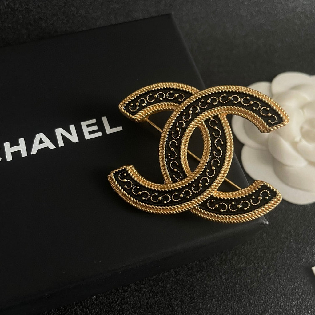Double-C Emblem Brooch in Polished Metal-Tone – Design 068 detail view