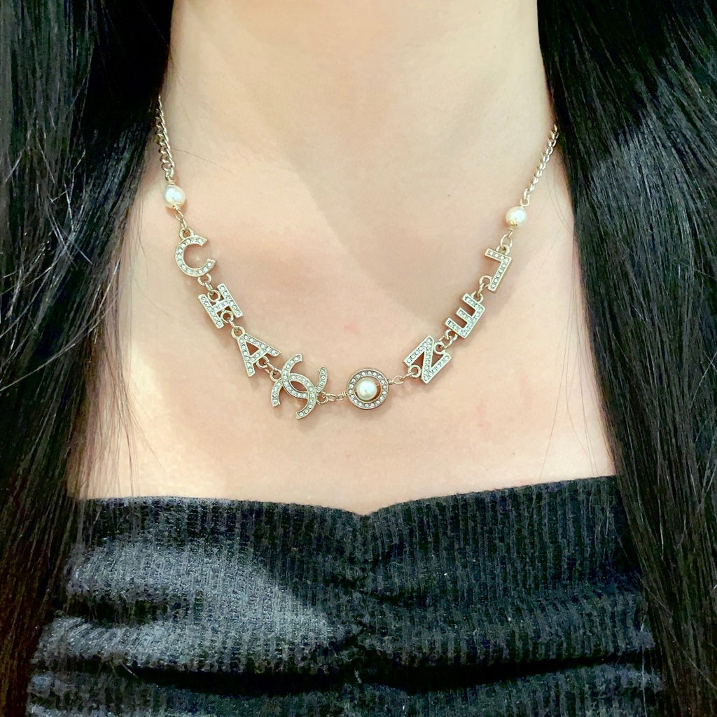 Double-C Emblem Pendant Necklace in Polished Metal-Tone – Design 055 detail view