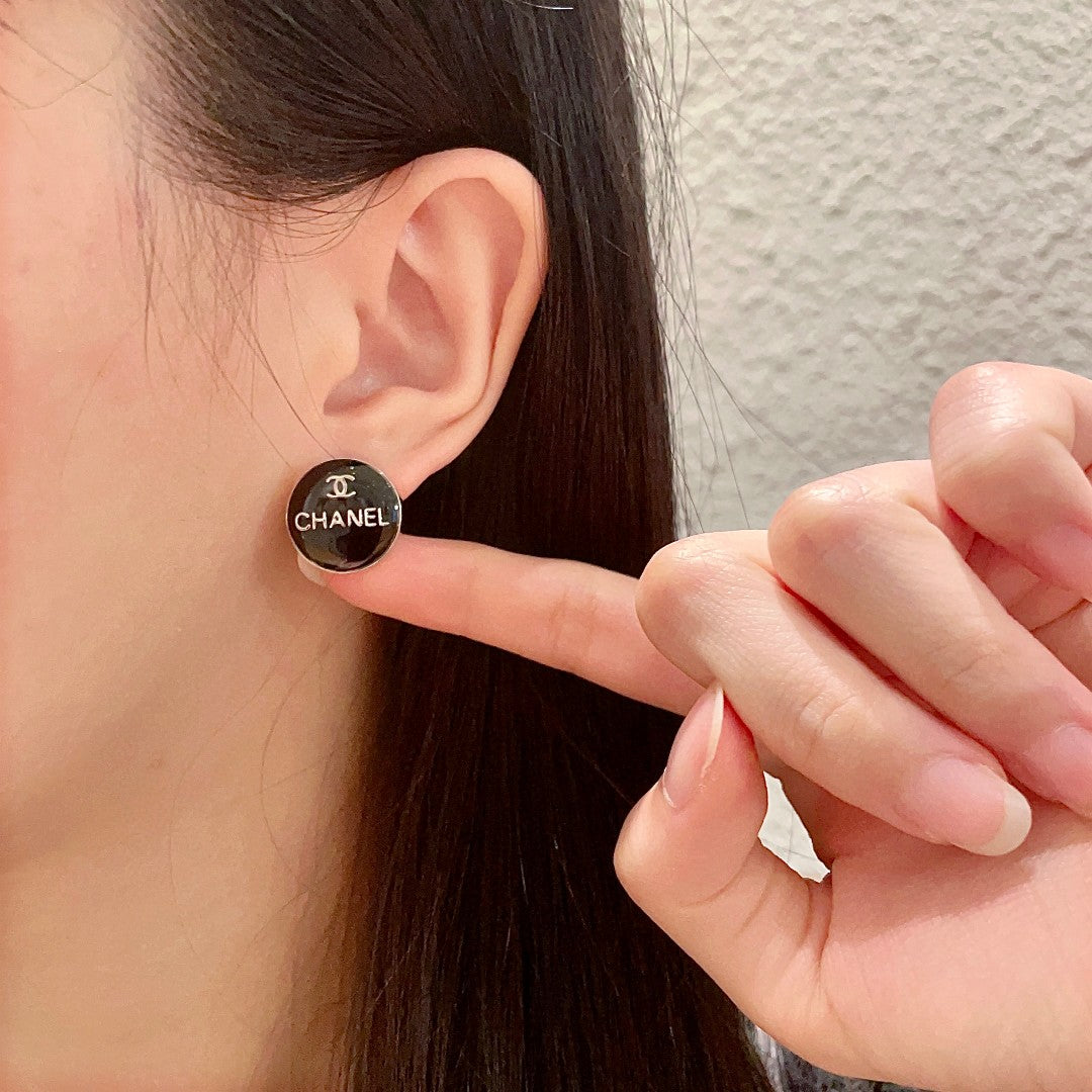 Double-C Emblem Stud Earrings in Polished Metal-Tone – Design 347 front product view