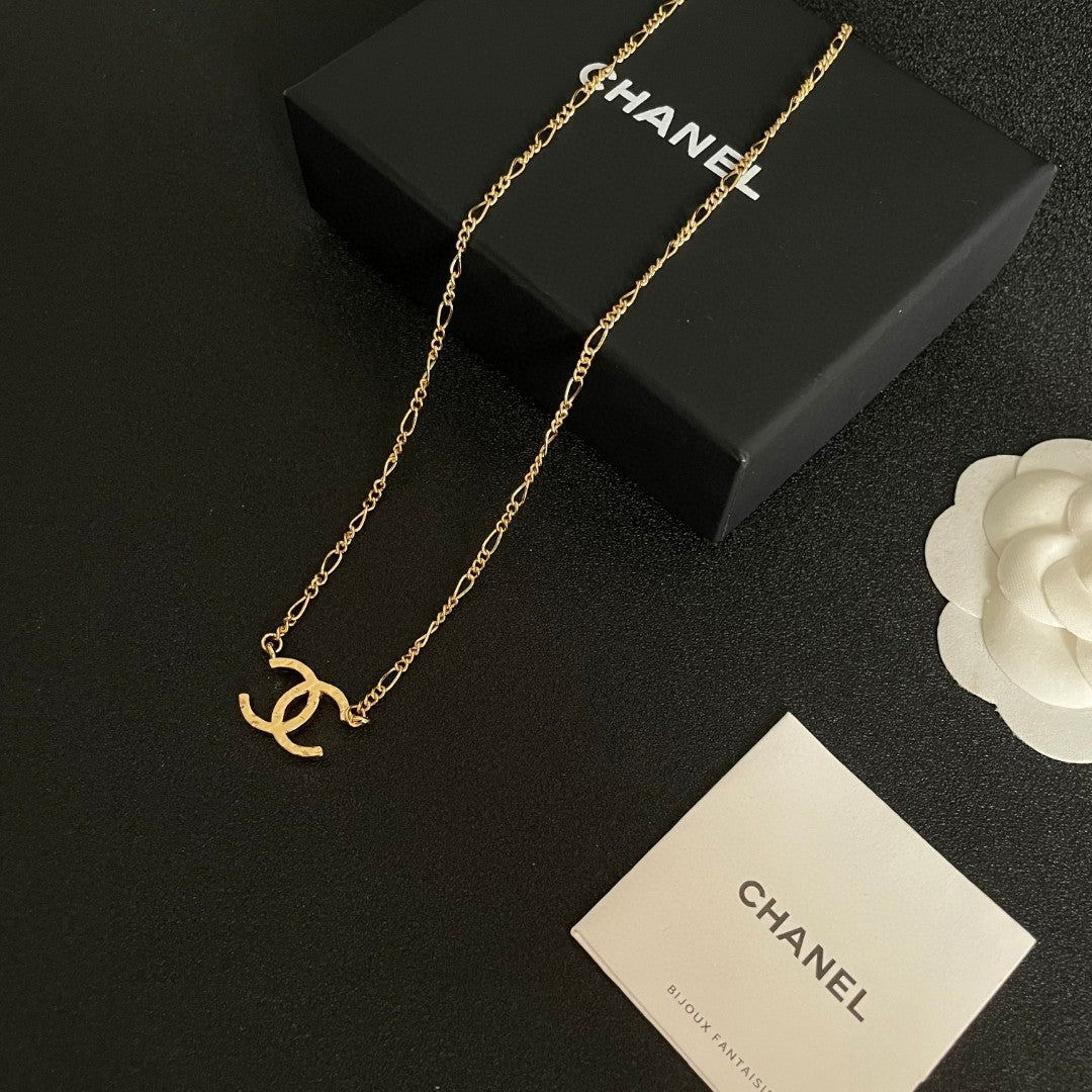 Double-C Emblem Pendant Necklace in Polished Metal-Tone – Design 051 close-up detail