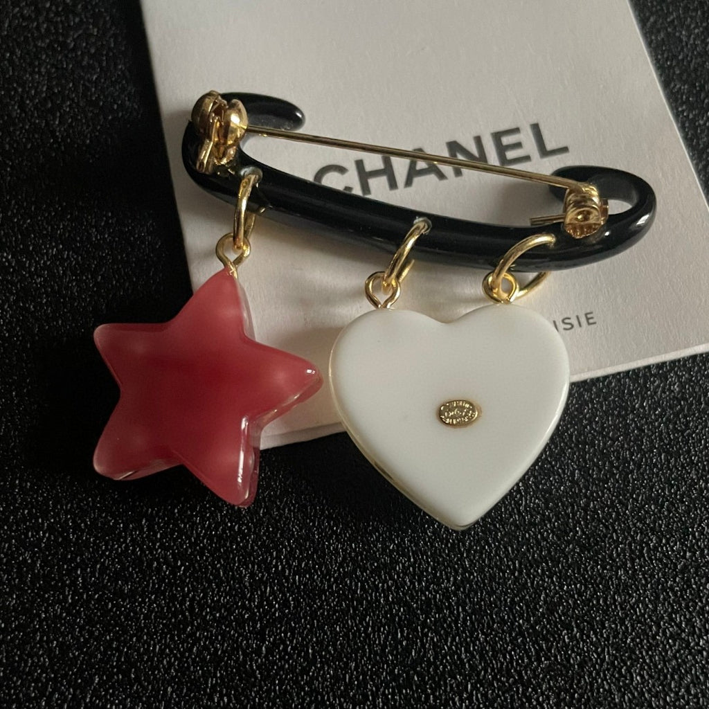 Double-C Emblem Brooch in Polished Metal-Tone – Star Detail main product view