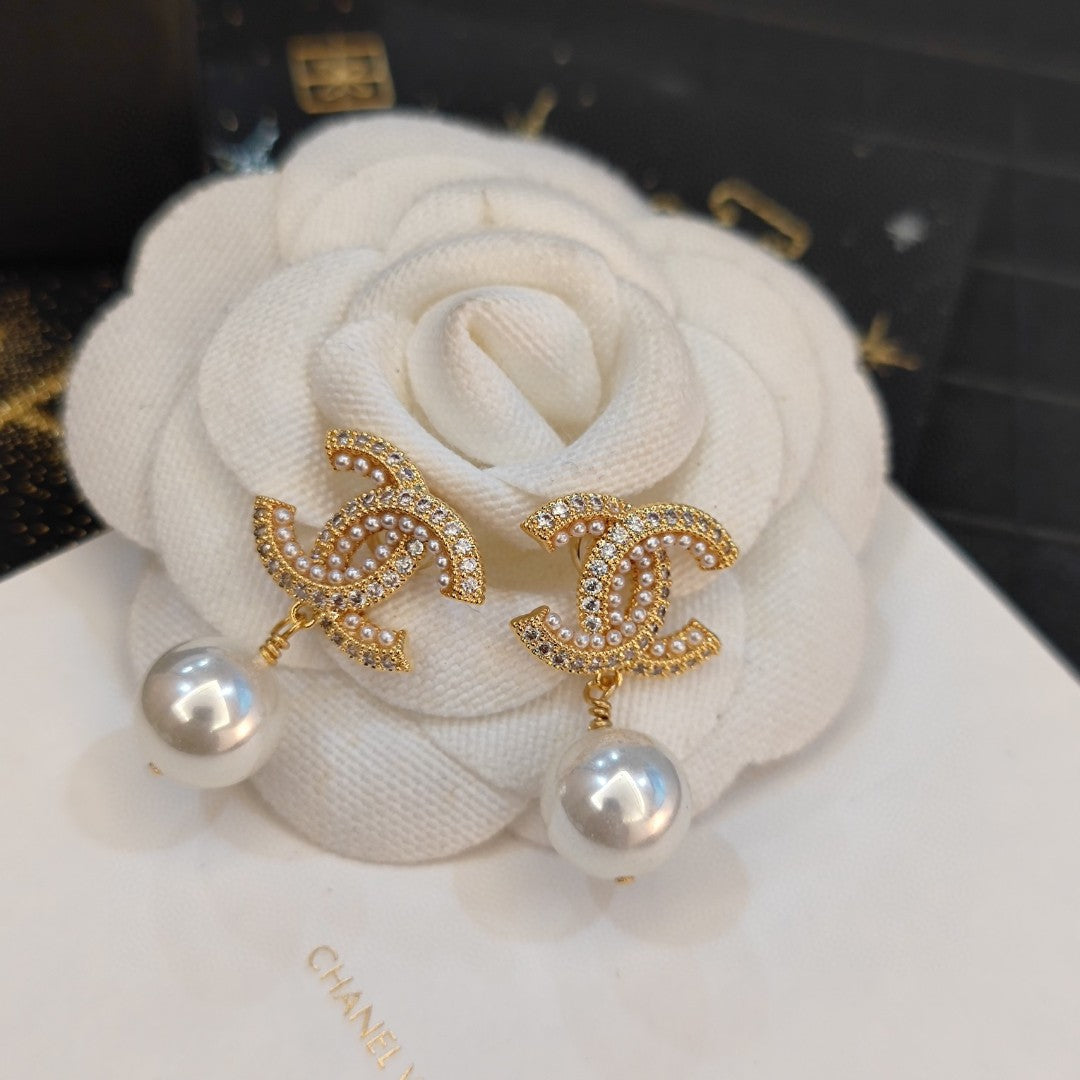 Letter Pearl-Detail Stud Earrings – Pearl Detail main product view