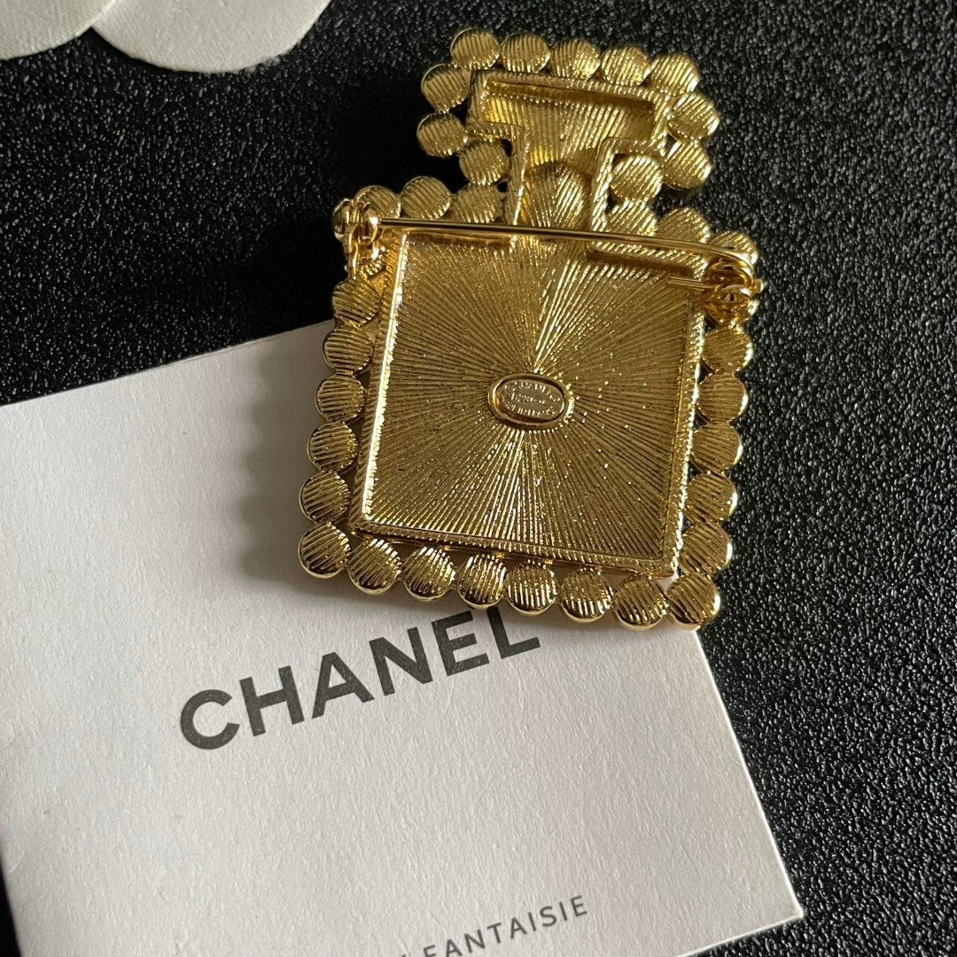 Double-C Emblem Brooch in Polished Metal-Tone – Pearl Detail – Design 007 main product view