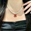 Double-C Emblem Pearl-Detail Pendant Necklace – Pearl Detail – Design 084 main product view