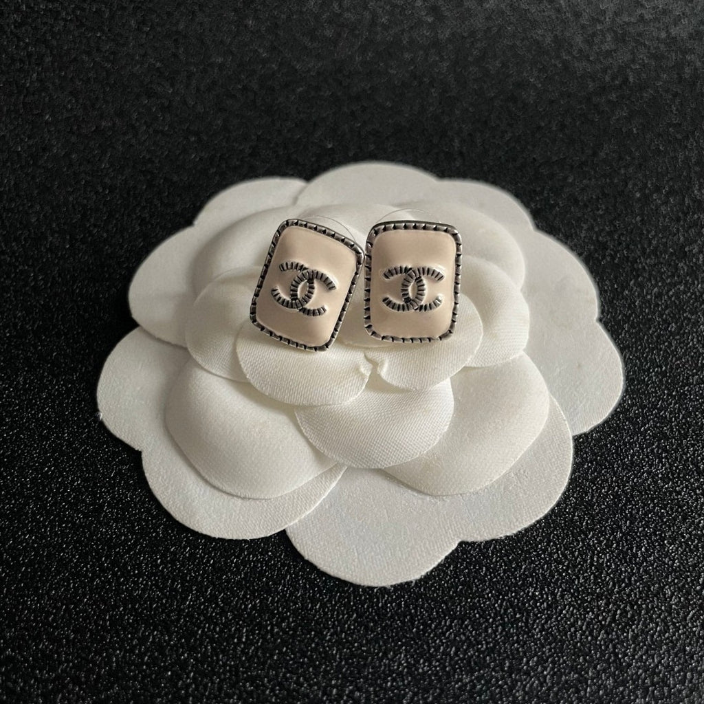 Double-C Emblem Stud Earrings in Polished Metal-Tone – Design 308 front product view