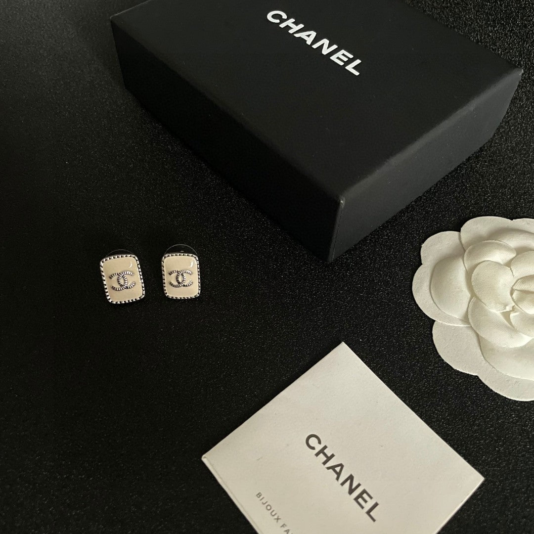 Double-C Emblem Stud Earrings in Polished Metal-Tone – Design 308 close-up detail