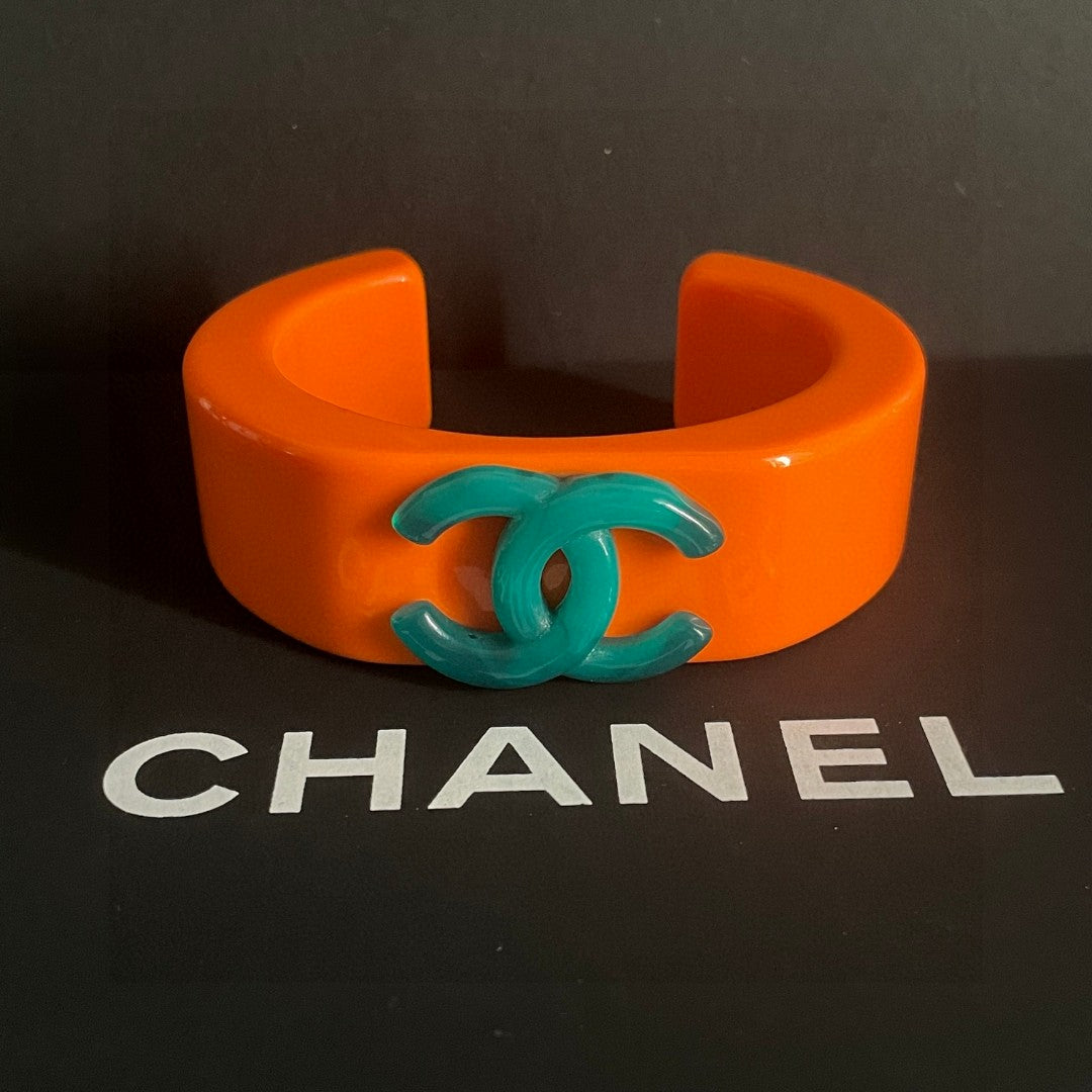 Double-C Emblem Bangle in Polished Metal-Tone – Design 002 detail view
