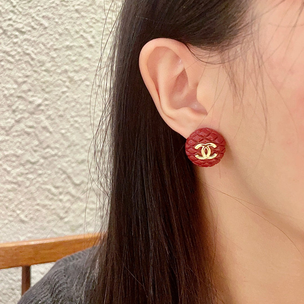 Double-C Emblem Stud Earrings in Polished Metal-Tone – Design 298 detail view