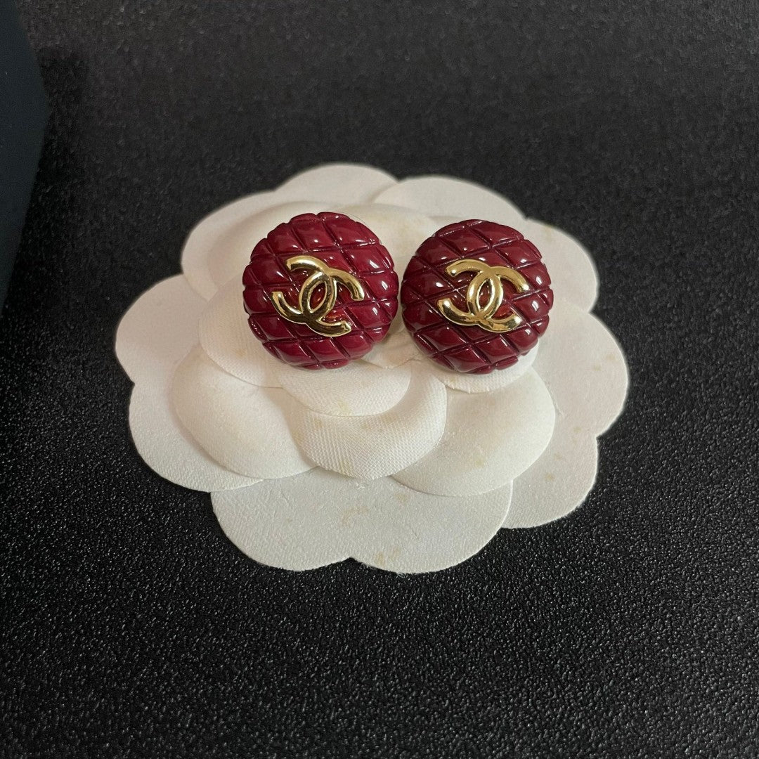 Double-C Emblem Stud Earrings in Polished Metal-Tone – Design 298 front product view
