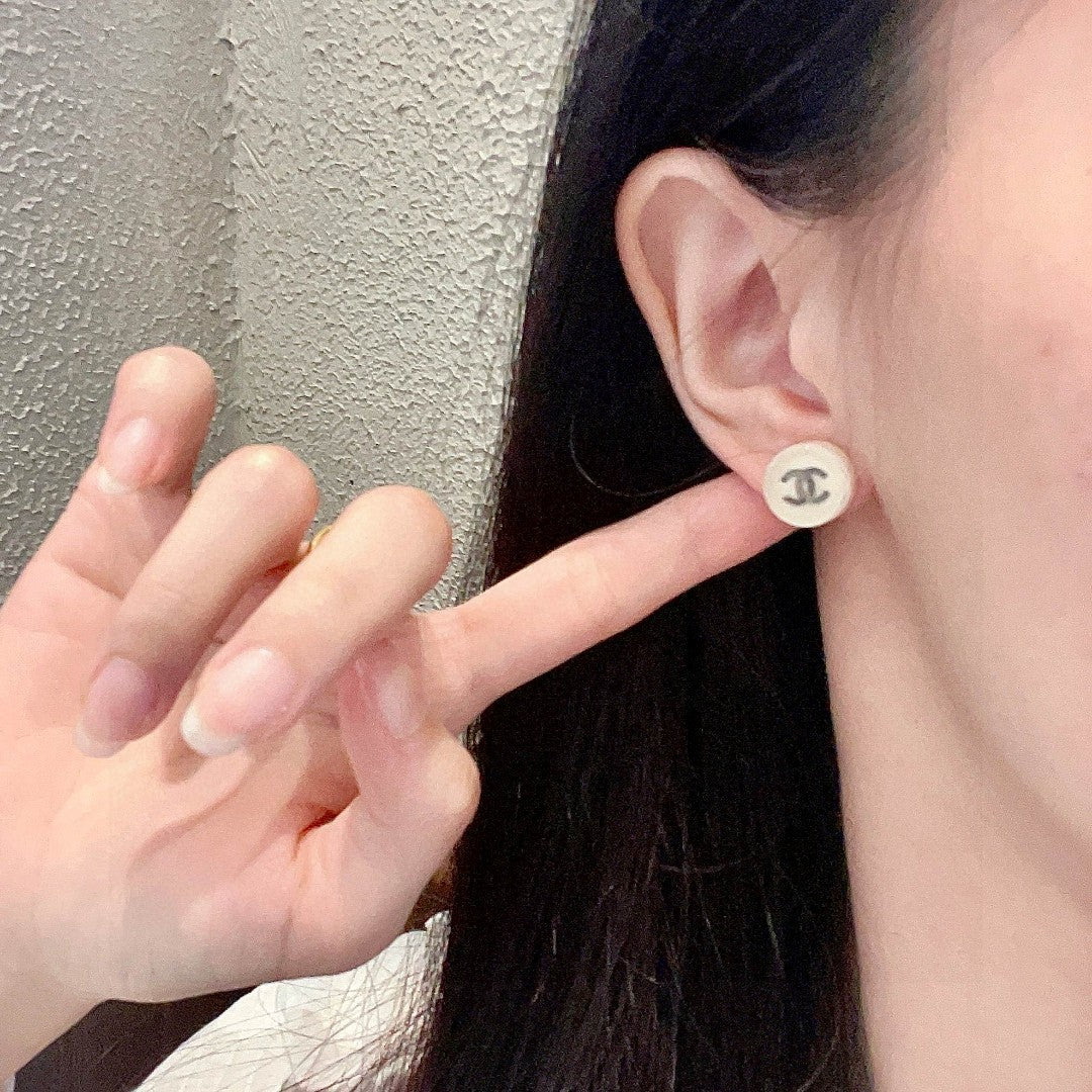 Double-C Emblem Stud Earrings in Polished Metal-Tone – Design 297 front product view