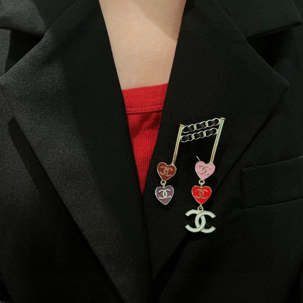 Double-C Emblem Brooch in Polished Metal-Tone – Heart Detail main product view
