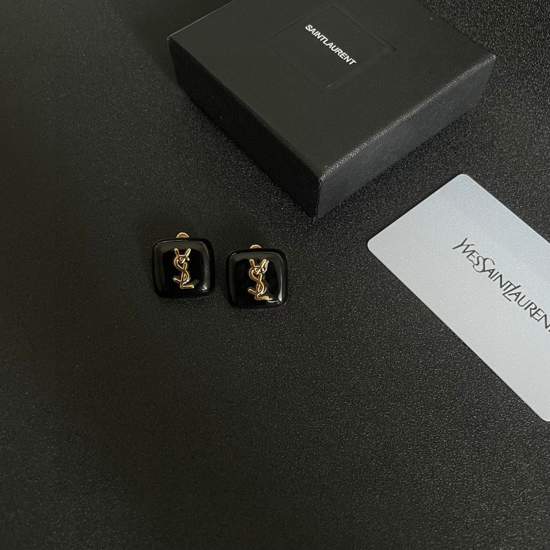 Letter Emblem Stud Earrings in Polished Metal-Tone – Square Detail close-up detail