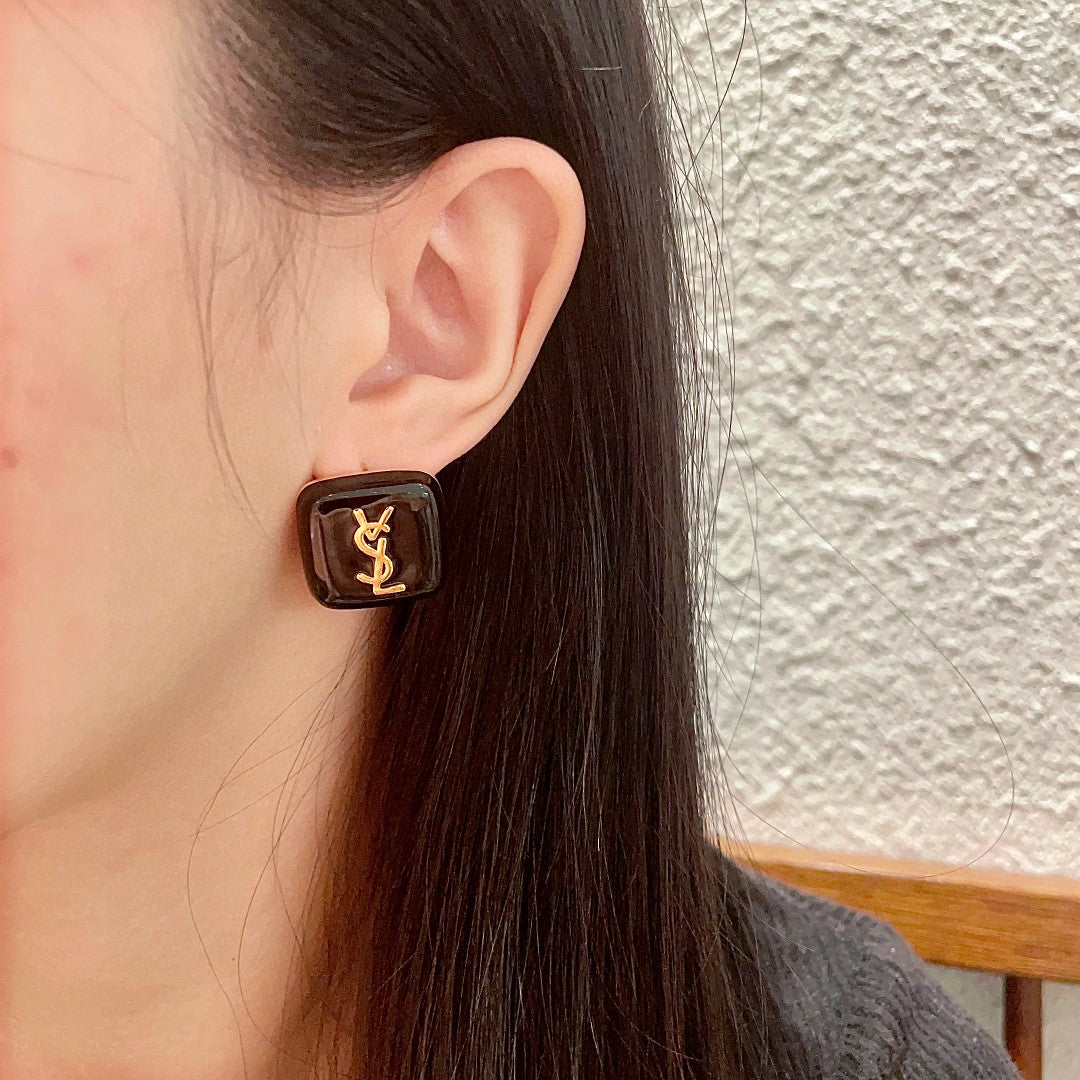 Letter Emblem Stud Earrings in Polished Metal-Tone – Square Detail detail view