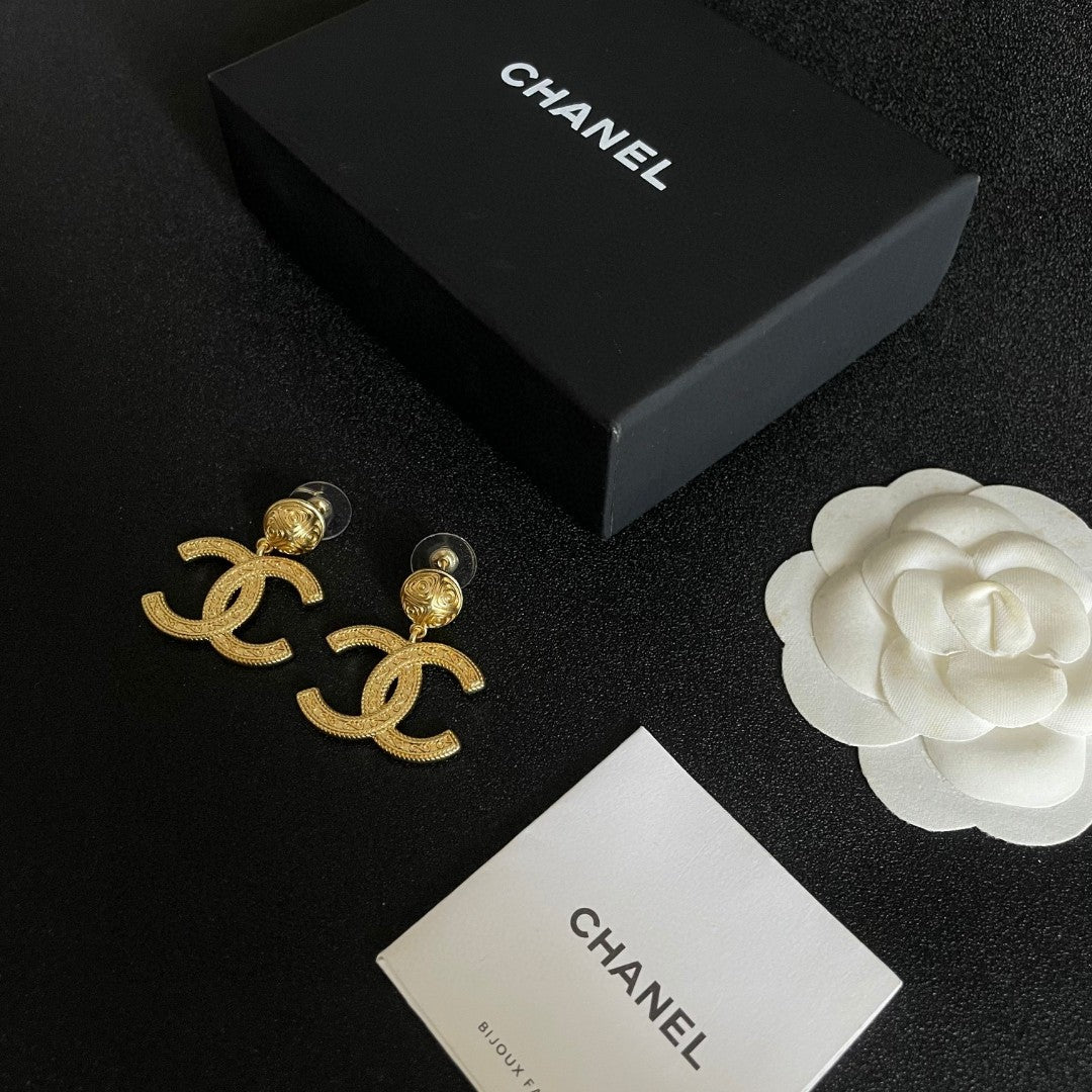 Double-C Emblem Statement Earrings in Polished Metal-Tone – Design 040 close-up detail