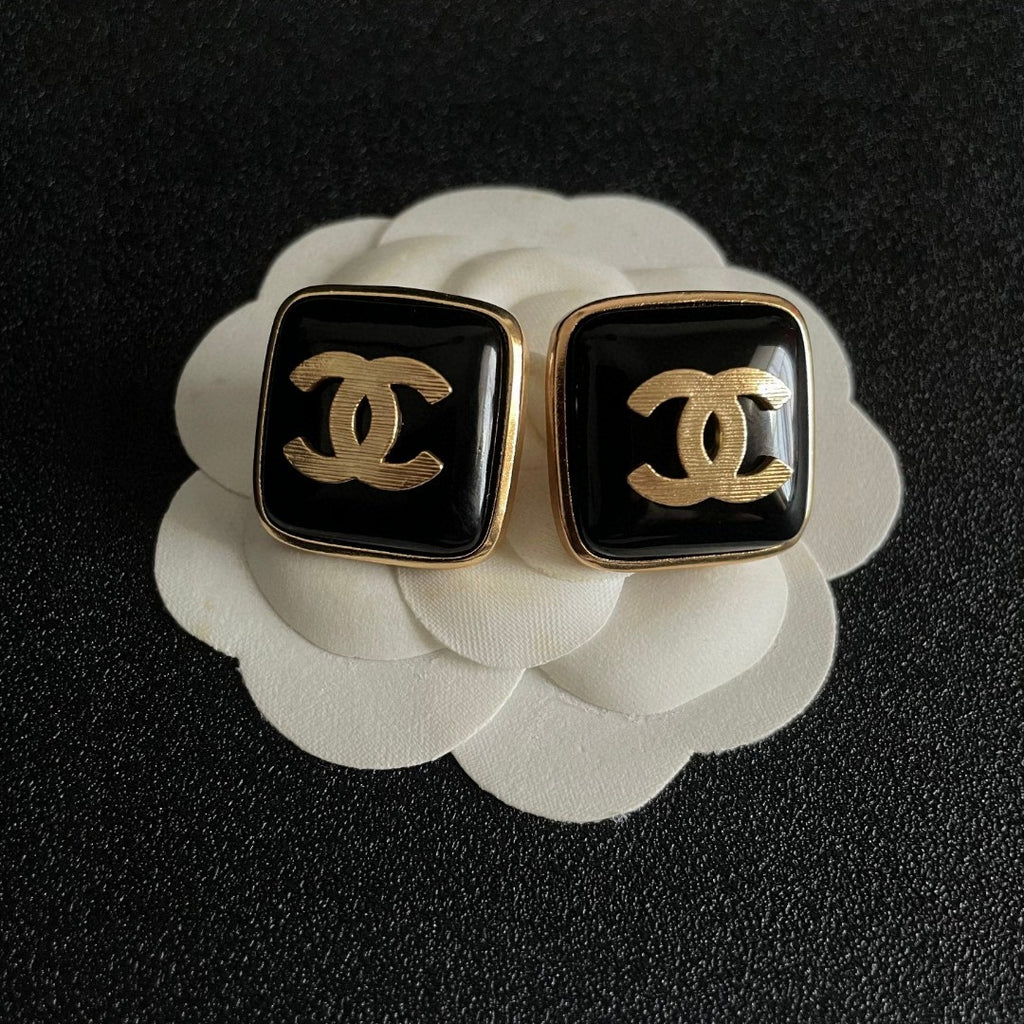 Double-C Emblem Stud Earrings in Polished Metal-Tone – Design 295 front product view