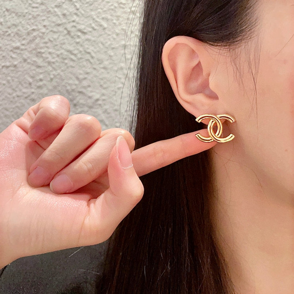 Double-C Emblem Stud Earrings in Polished Metal-Tone – Design 263 front product view