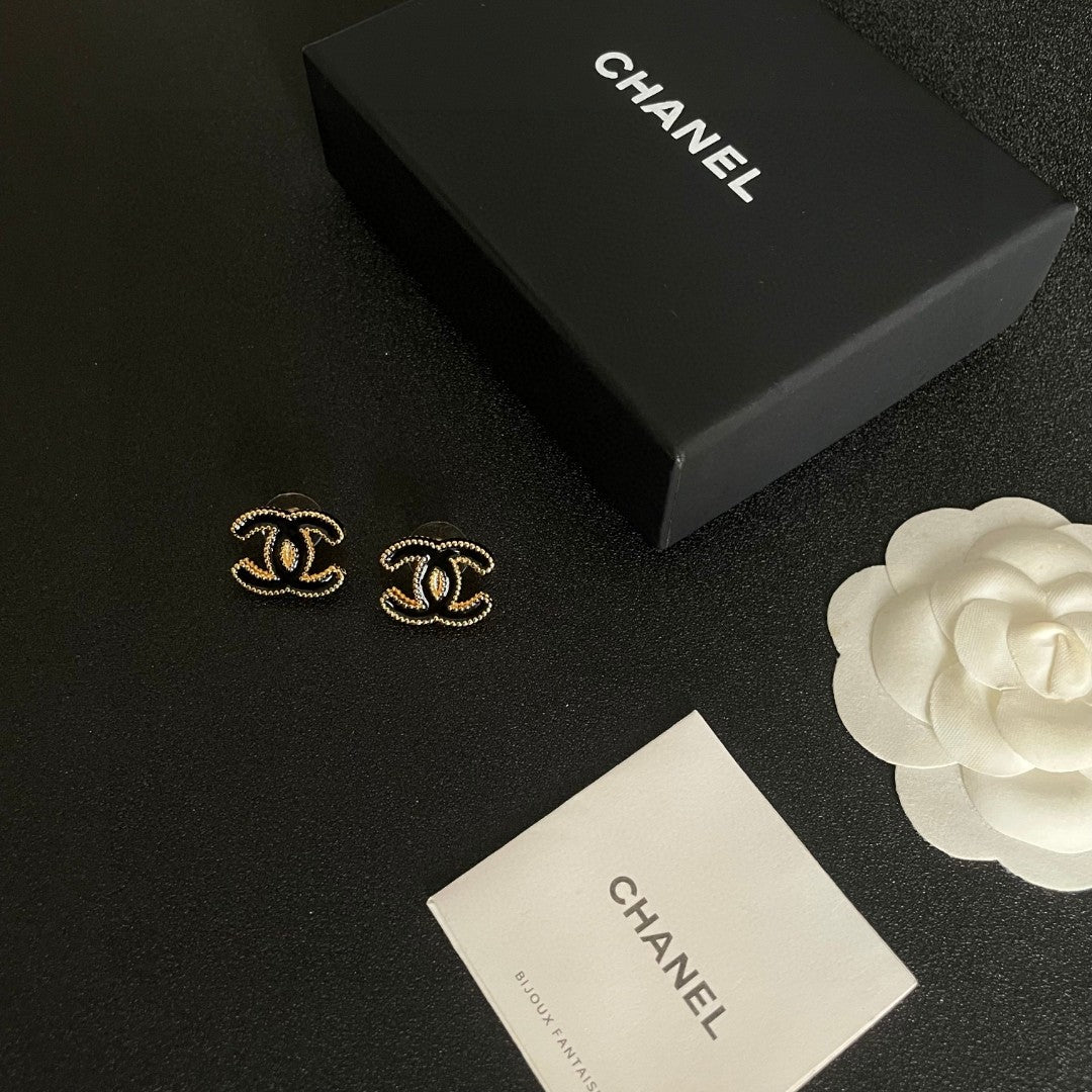Double-C Emblem Stud Earrings in Polished Metal-Tone – Design 262 close-up detail