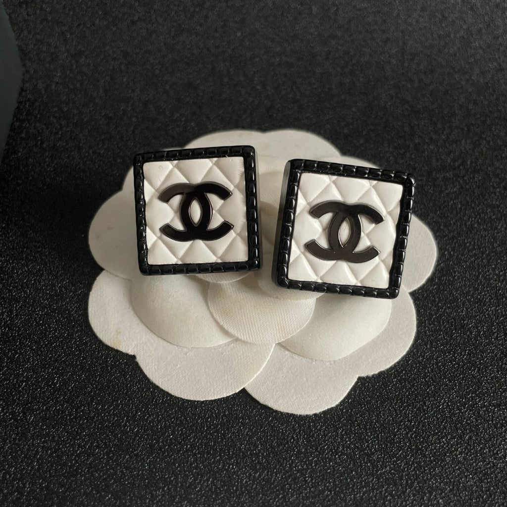 Double-C Emblem Stud Earrings in Polished Metal-Tone – Design 228 front product view