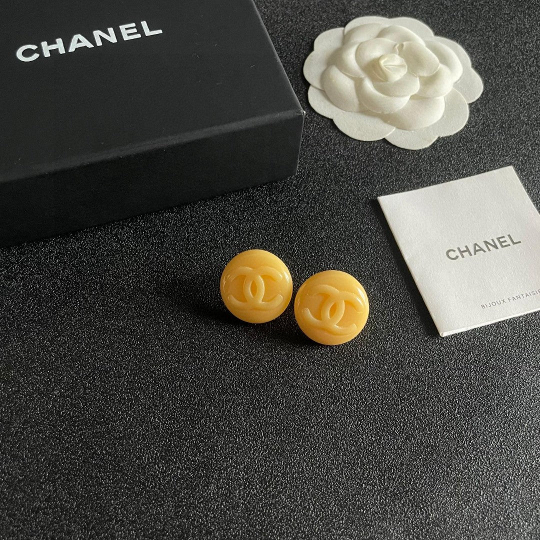 Double-C Emblem Stud Earrings in Polished Metal-Tone – Design 227 styled product view