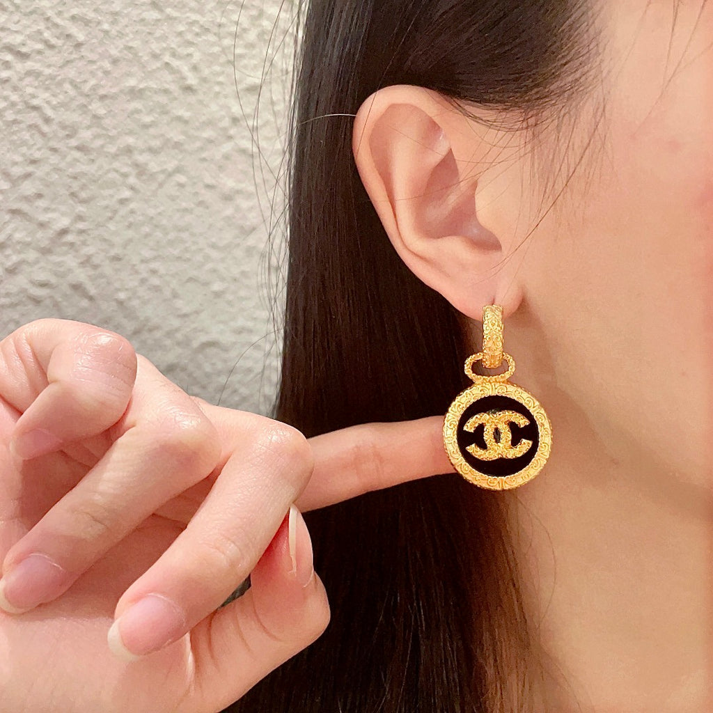 Double-C Emblem Stud Earrings in Polished Metal-Tone – Design 242 front product view