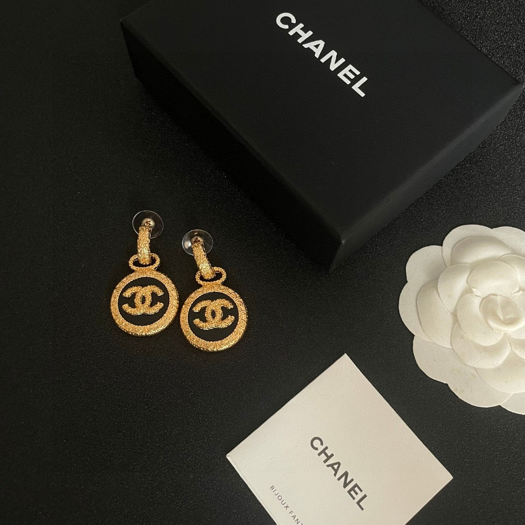Double-C Emblem Stud Earrings in Polished Metal-Tone – Design 242 close-up detail