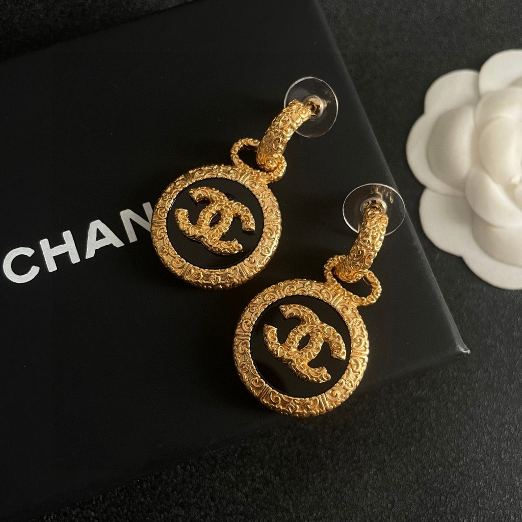 Double-C Emblem Stud Earrings in Polished Metal-Tone – Design 242 detail view