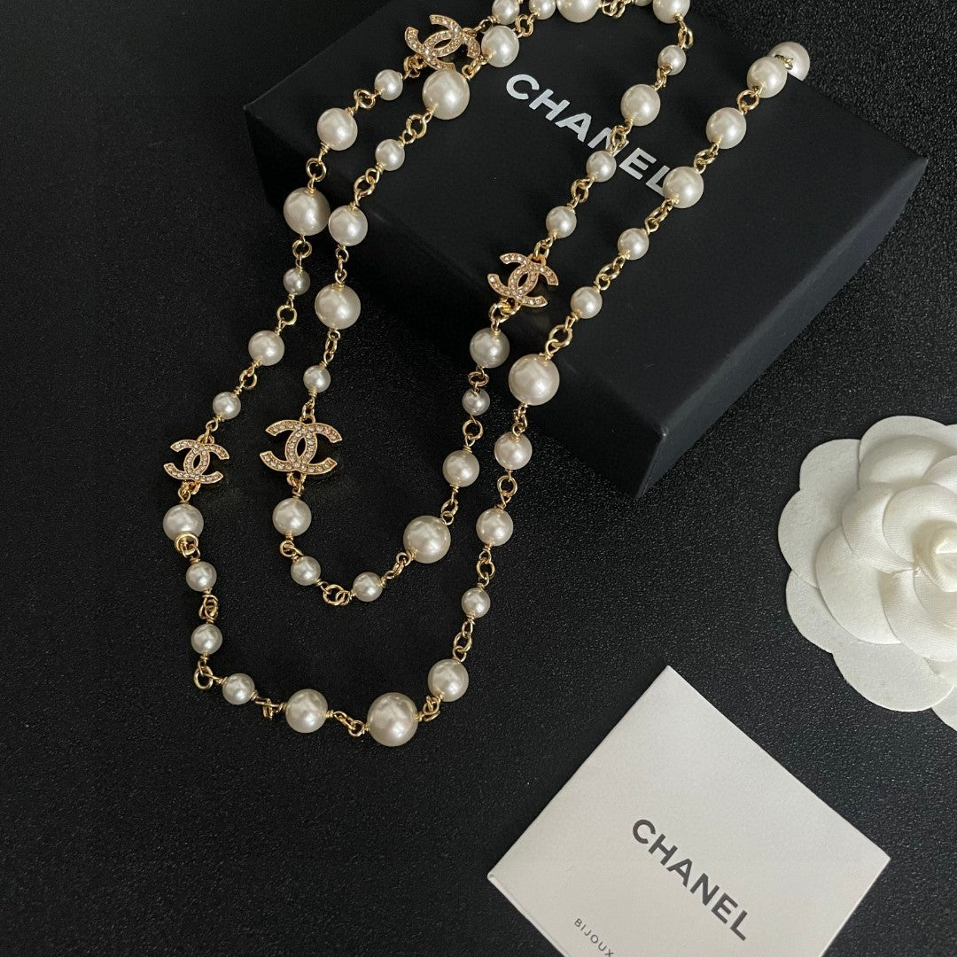 Double-C Emblem Pearl-Detail Pendant Necklace – Pearl Detail – Design 061 close-up detail
